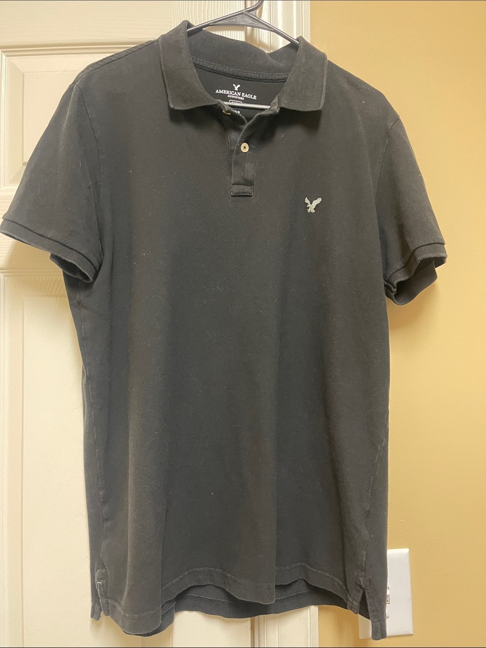 American Eagle Outfitters Black Polo with Embroidered Eagle